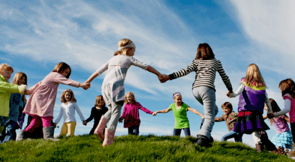 Group of kids playing in a circle