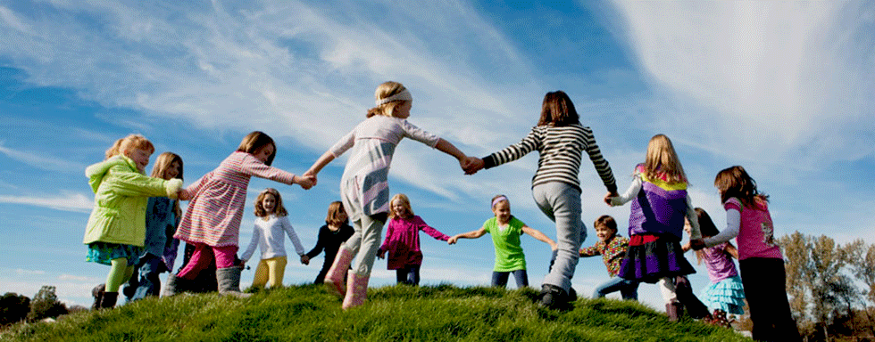 Group of kids playing in a circle