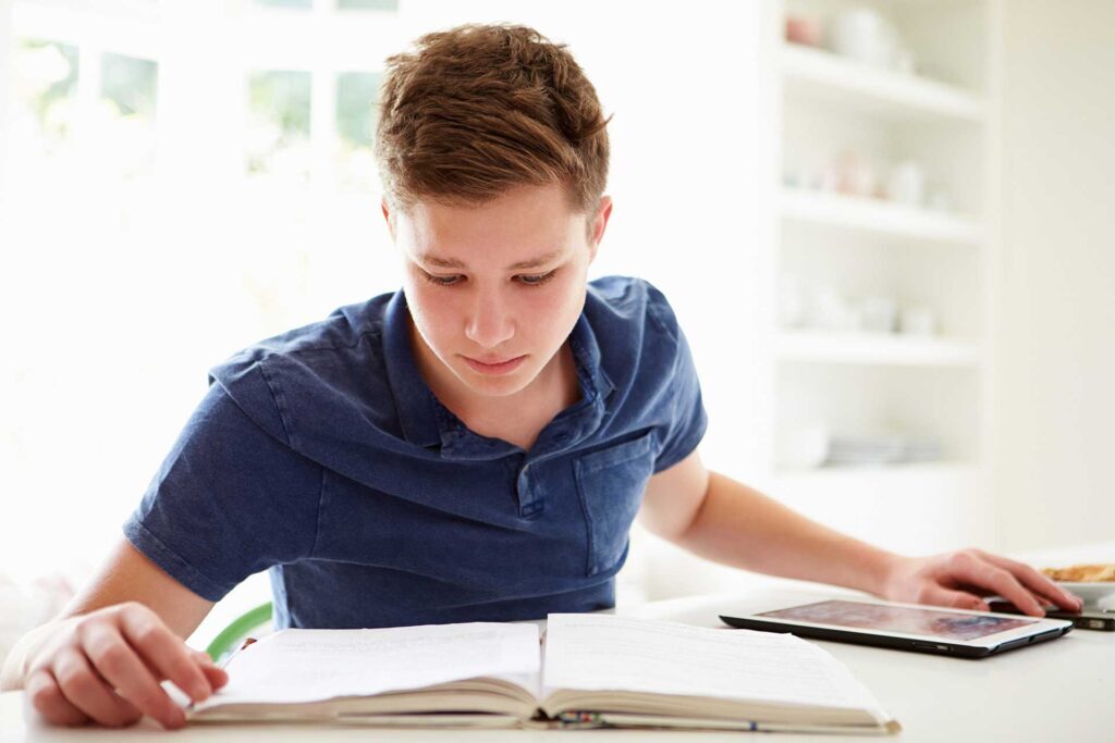 A middle-school student studies Wilson language materials in a Just Words lesson.