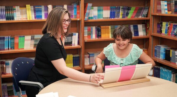 A special educator works with a student on an Orton-Gillingham lesson