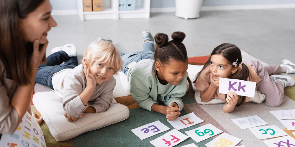 kids on floor learning