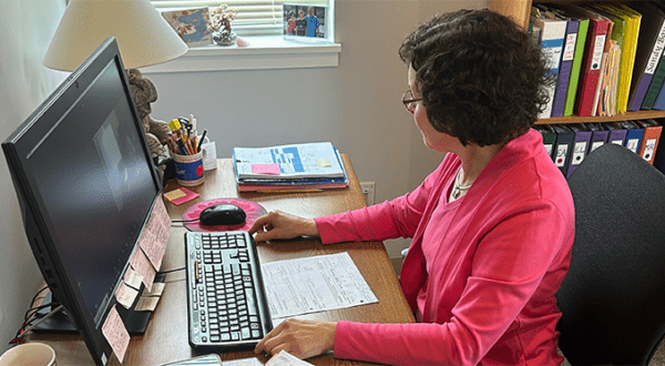 teacher-at-computer-teaching