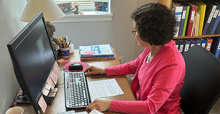 teacher-at-computer-teaching