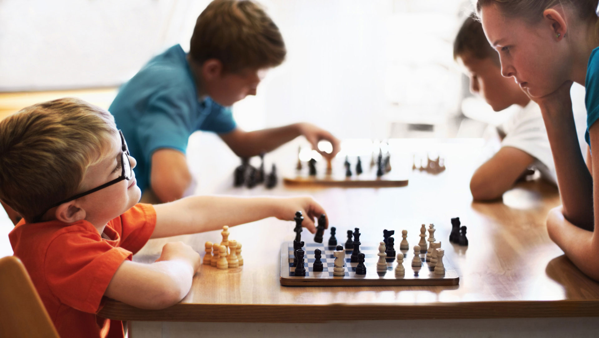 Two children playing chess