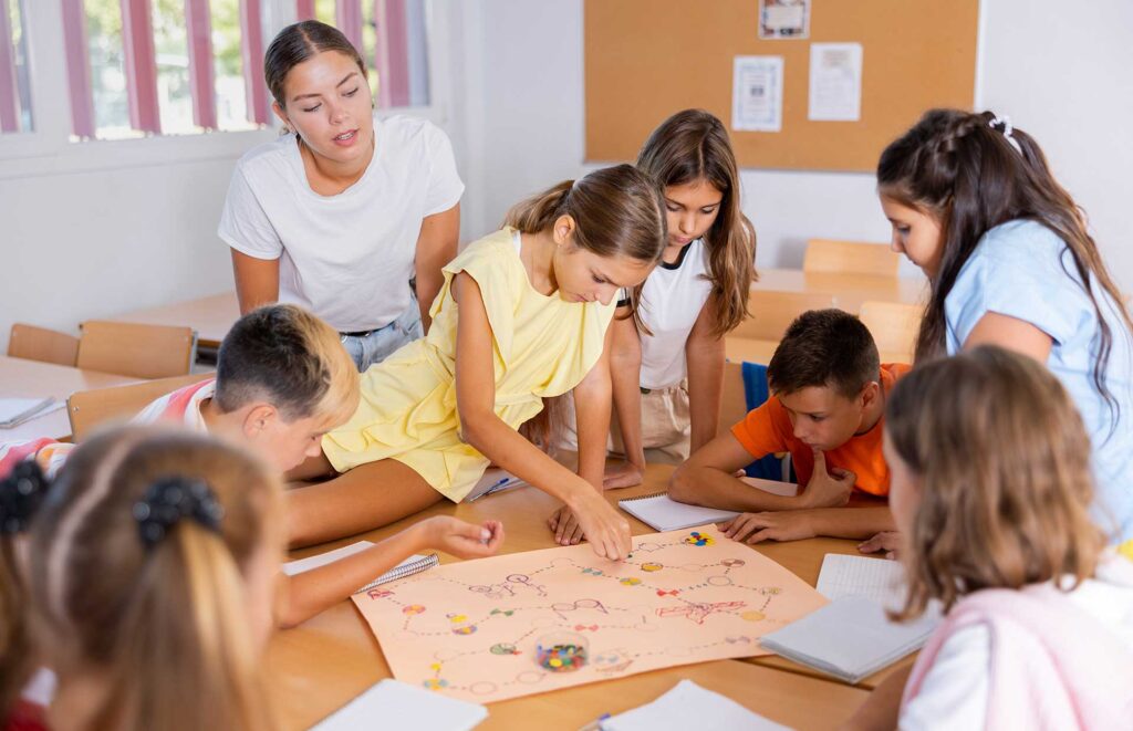 Students play a game as part of a Social Thinking group in school.