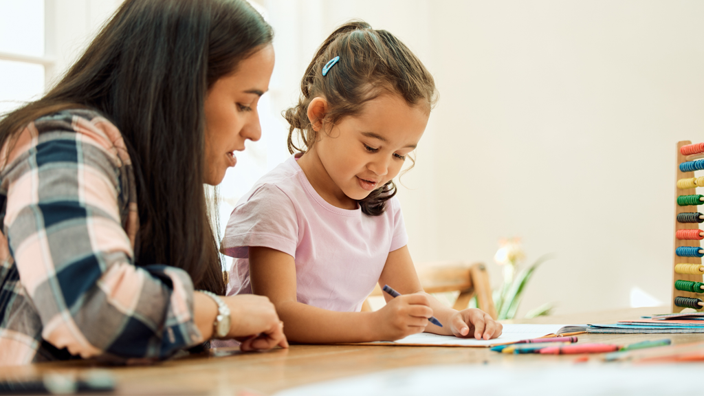 child working with student