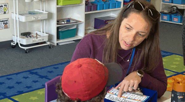 teacher with student