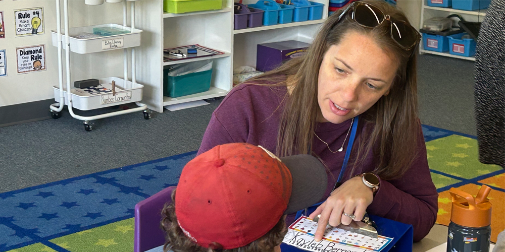 teacher with student